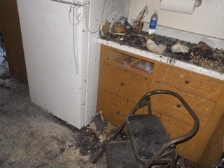 Before: A fire-blackened counter beside the refrigerator.